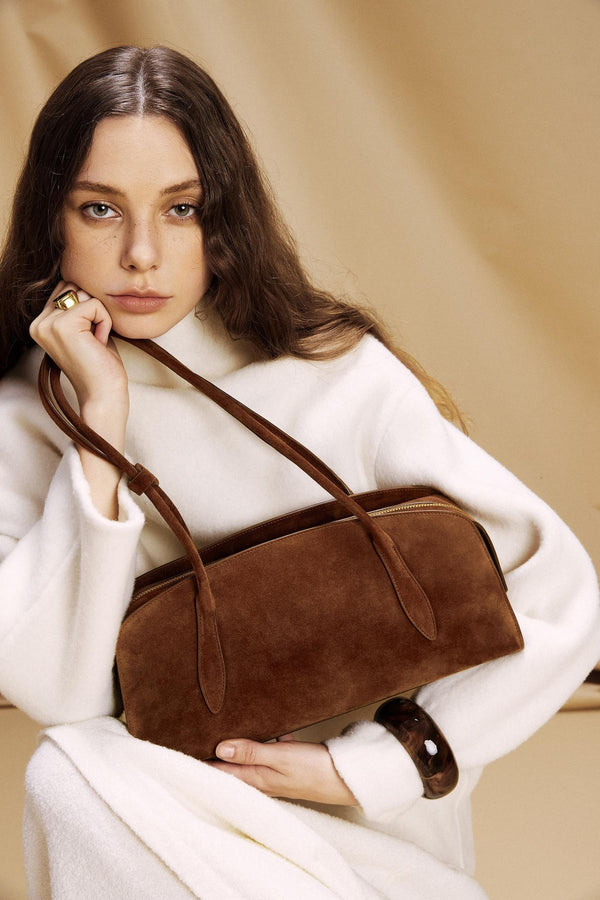 Your Outfit Isn’t Done Without the Right Bag